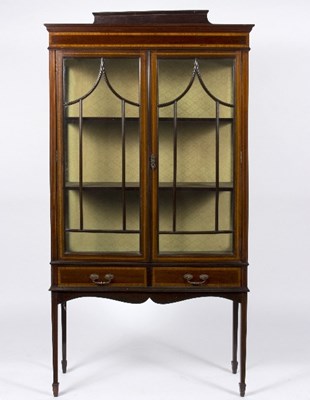 Lot 404 - An Edwardian mahogany display cabinet with a...