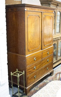 Lot 412 - A George III mahogany linen press adapted for...