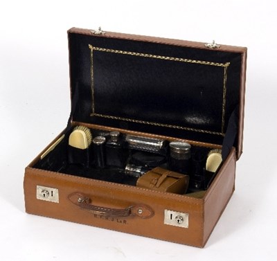 Lot 459 - A gentleman's fitted leather dressing case...