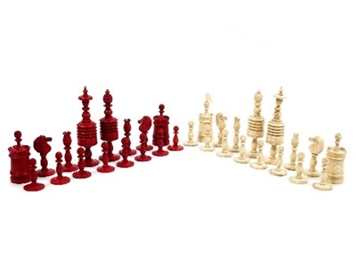 Lot 466 - A mid 19th Century bone and red stained chess...