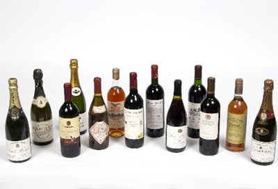 Lot 472 - Thirteen bottles of various wine and champagne...