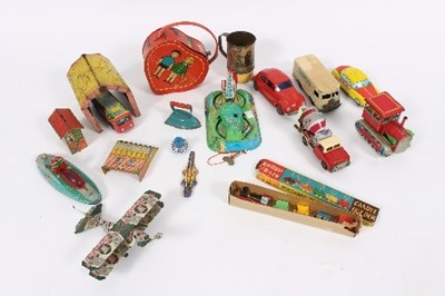 Lot 515 - A quantity of tinplate toys to include a...