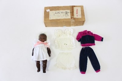 Lot 521 - An Armand Marseille German black baby doll...