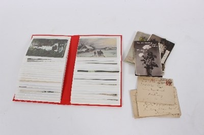 Lot 559 - An album of eighty Edward VII postcards,...