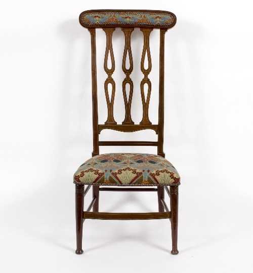 Lot 8 - An Arts and Crafts chair, retailed by P E Gane...