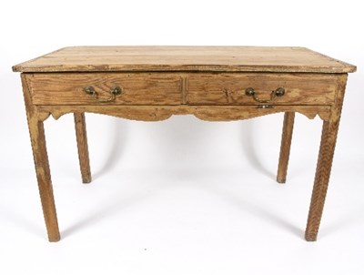 Lot 21 - A pine table, fitted two drawers, on square...