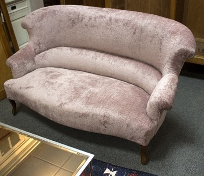 Lot 23 - A pale purple velour two seater settee, on...