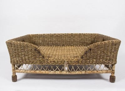 Lot 25 - A large wicker dog's bed, possibly OKA, 107cm...