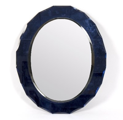 Lot 36 - A modern oval wall mirror, the bevelled plate...
