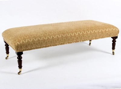 Lot 55 - A rectangular footstool with upholstered seat...