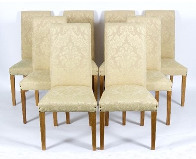 Lot 58 - Eight dining chairs upholstered in buttermilk...