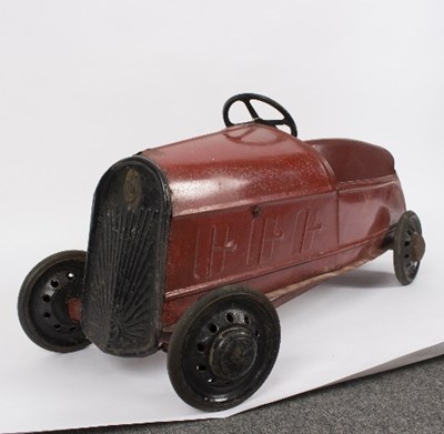 Lot 85 - An early 20th Century pedal car, with rubber...