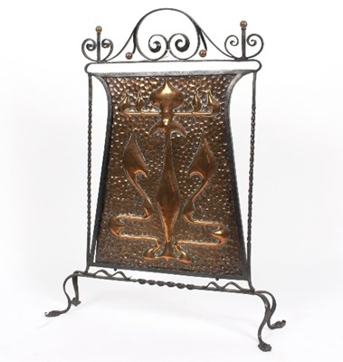 Lot 87 - An Art Nouveau copper fire screen, hammered...