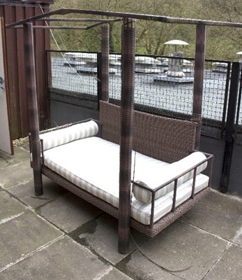 Lot 95 - An OKA garden wicker type opium bed and...