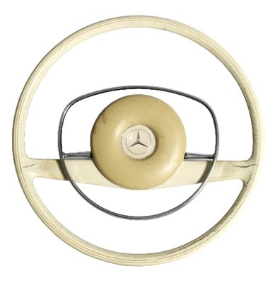 Lot 97 - A Mercedes steering wheel in cream