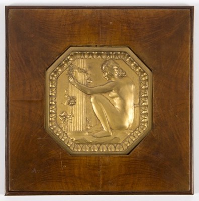 Lot 390 - A French Art Deco gilt metal plaque, of...