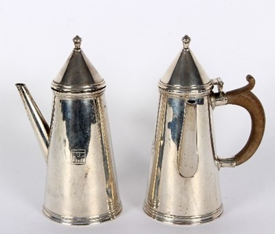 Lot 511 - A pair of Art Deco silver chocolate pots, TB &...