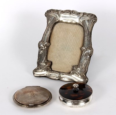 Lot 514 - An Art Nouveau silver mounted photograph frame,...