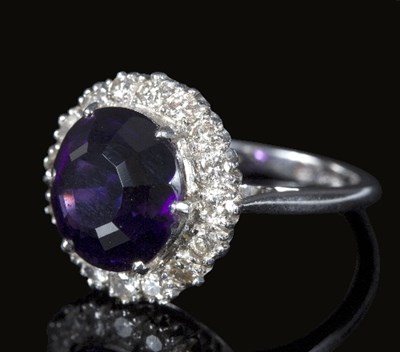 Lot 537 - An amethyst and diamond cluster ring, the...