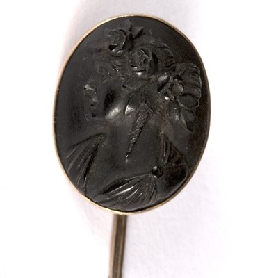 Lot 545 - A Victorian pin brooch, the oval mount set a...