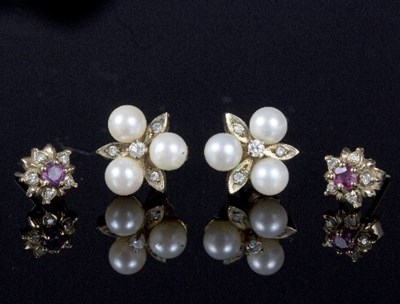 Lot 560 - A pair of cultured pearl and diamond ear studs...