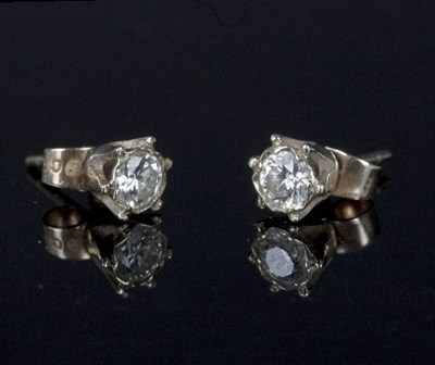 Lot 574 - A pair of diamond set ear studs, each...