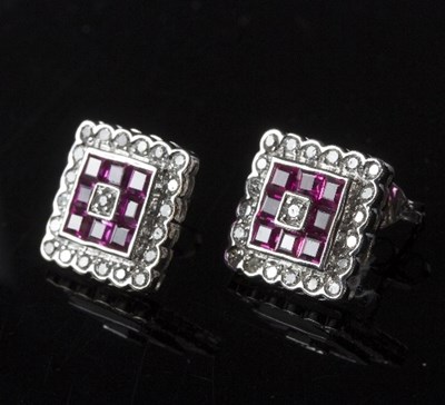 Lot 578 - A pair of ruby and diamond ear studs, of...