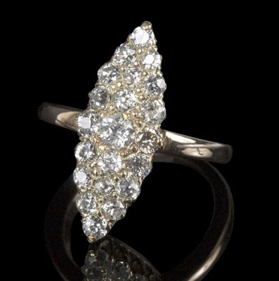 Lot 584 - A diamond cluster ring of navette form, set...