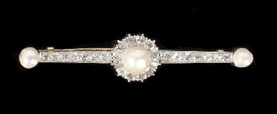 Lot 593 - A pearl and diamond bar brooch, the central...