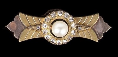 Lot 594 - A pearl and diamond propeller brooch, the...