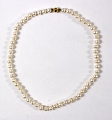 Lot 599 - A cultured pearl necklace, with 9ct gold ball...