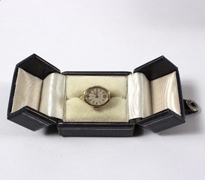 Lot 600 - A 'Plato' ring watch, the oval dial to a...