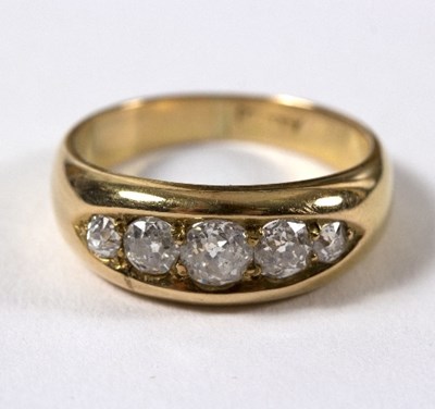 Lot 604 - A diamond five-stone ring, the central stone...