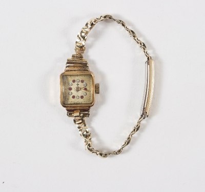 Lot 630 - A lady's 18ct gold cocktail watch with square...