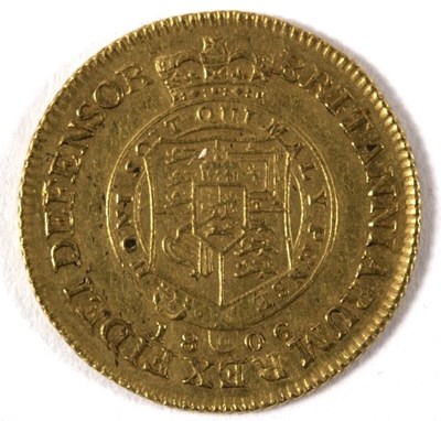 Lot 640 - A George III gold half-guinea dated 1806,...