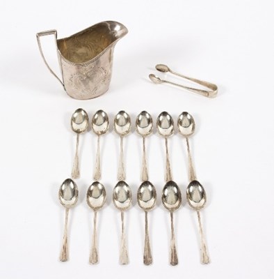 Lot 662 - A set of twelve silver coffee spoons and the...