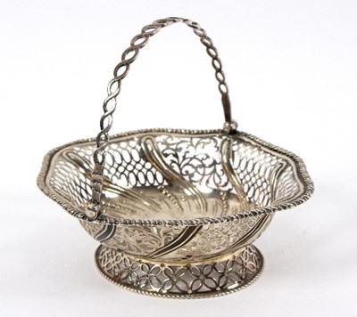 Lot 670 - A George III small silver basket, possibly...