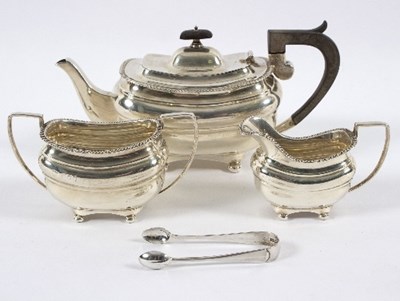 Lot 676 - A bachelor's silver tea set, the teapot marked...