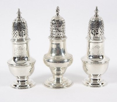 Lot 678 - A pair of George II silver casters, JW, London...