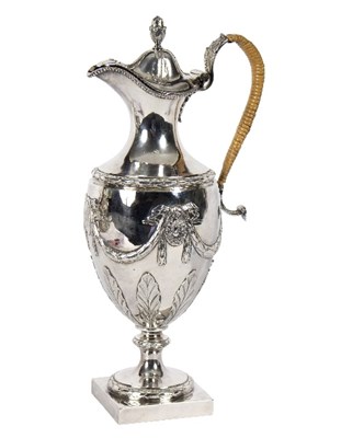 Lot 696 - A Georgian silver claret jug, London 1776,...