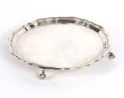 Lot 722 - A silver waiter, London 1923, with raised...