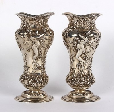 Lot 752 - A pair of silver vases, import marks London...