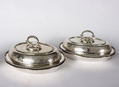 Lot 789 - A pair of small silver plated tureens and...