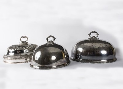 Lot 793 - Three silver plated dish covers, various...