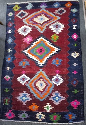 Lot 800 - A Navajo style rug, worked with geometric...