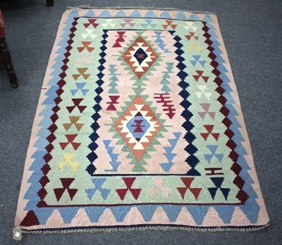 Lot 801 - A Navajo style rug, worked in pastel colours...