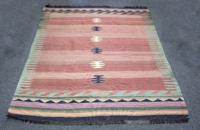 Lot 802 - A Navajo style rug, worked with six black and...