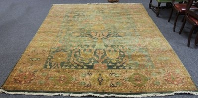 Lot 805 - A Turkey style carpet with central green...