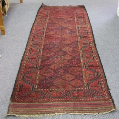 Lot 810 - A Belouch runner, North East Persia, 203cm x...