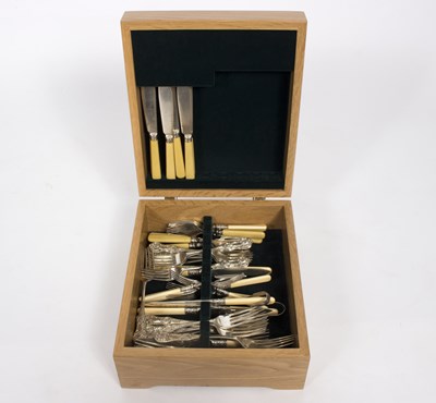 Lot 52 - A canteen of plated flatware including fish...